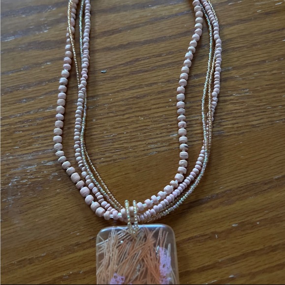 Necklace cute four bead strands 21” with plastic 2” pendant in soft peach color. - Picture 4 of 7